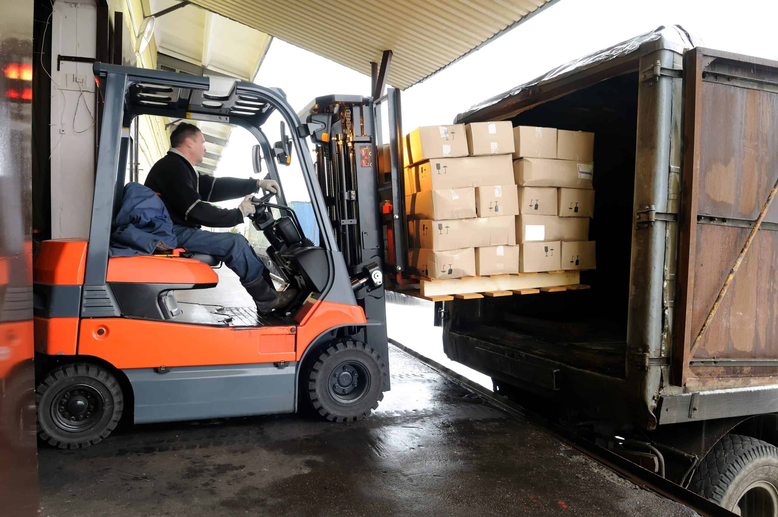 Forklift in warehouse Forklift loading boxes