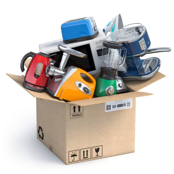 Household kitchen appliances in open cardboard box ready for appliance fulfillment via eCommerce and online shopping concept. Microwave oven, blander, processor, toaster, teapot. 3d illustration